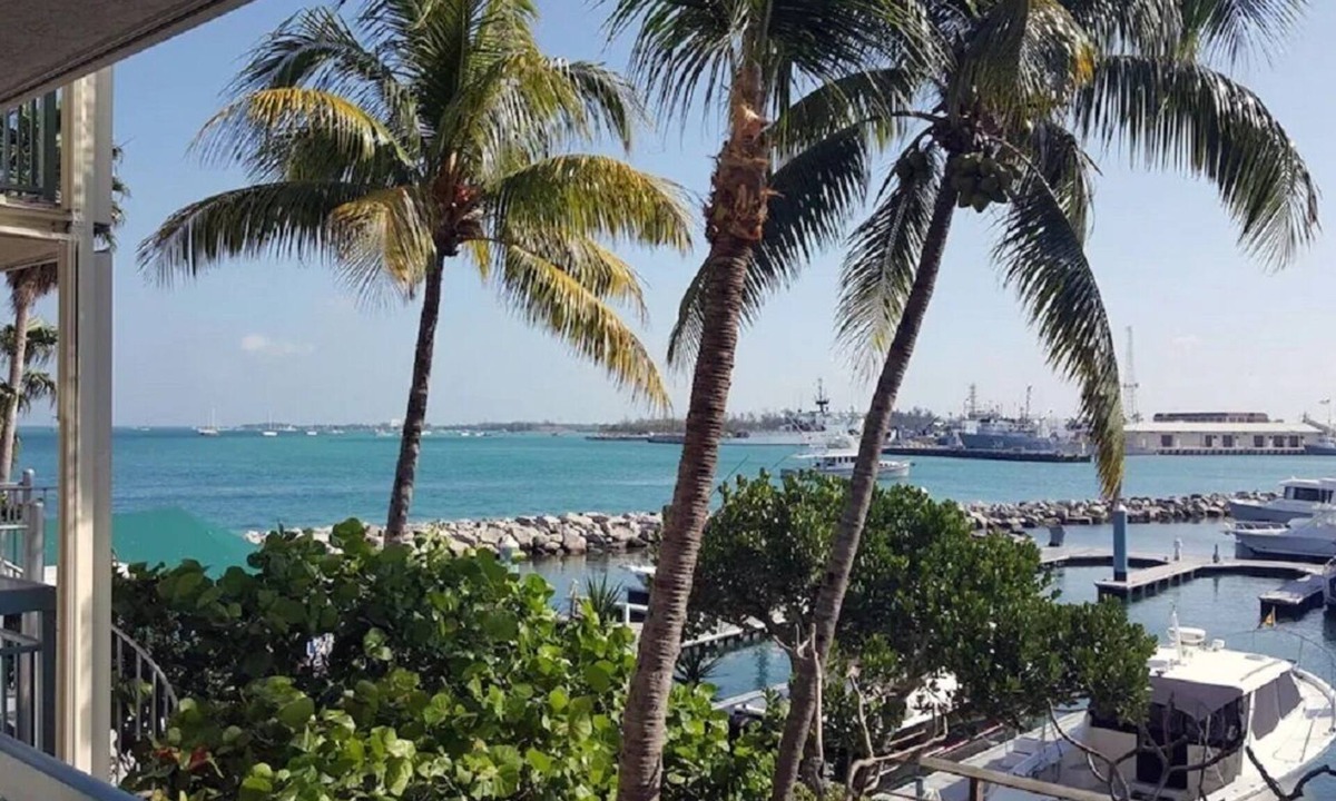 Historic Seaport Resort | Galleon Resort - Balcony Overlooking Marina w/ Stair to Boardwalk, Sleeps 6