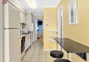 Lovely 1-bedroom condo with free WiFi, cute coastal decor, and an outdoor pool located midtown and just steps to the beach!
