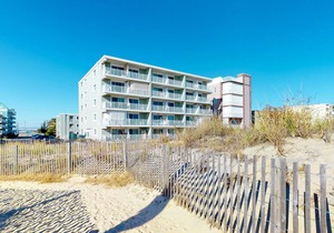 Partial Ocean View Condo in Oceanfront Building with Balcony, WiFi & Laundry