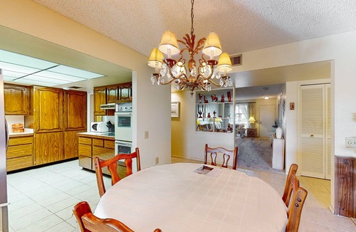 Sun City House | Comfortable stay with a pool, tennis court, and gym access, washer/dryer, & AC