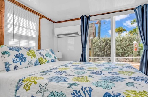 Key Colony Beach Cabin | Delightful Sailfish Aqua lodge! Cabana Club Access!