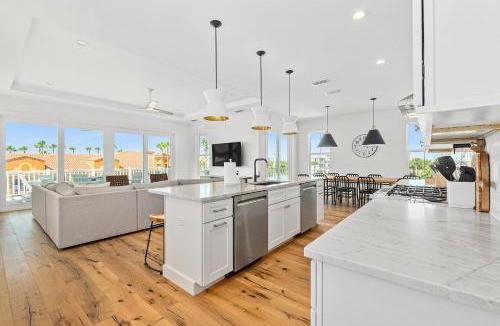 St. Augustine Beach House | Endless Summer Oasis- Luxury 5br, heated pool, elevator, steps to ocean!