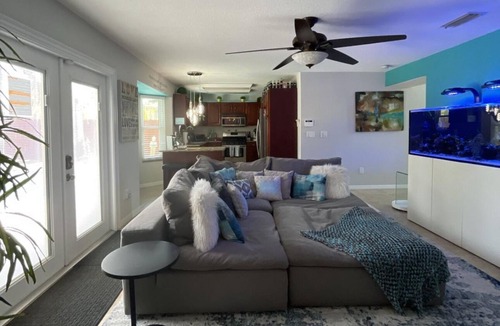 Tropic House | Family Oasis. Heated Pool, Hot Tub, Theater room & Salt Water Aquarium