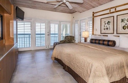 Historic Seaport Resort | Galleon Resort - Balcony Overlooking Marina w/ Stair to Boardwalk, Sleeps 6