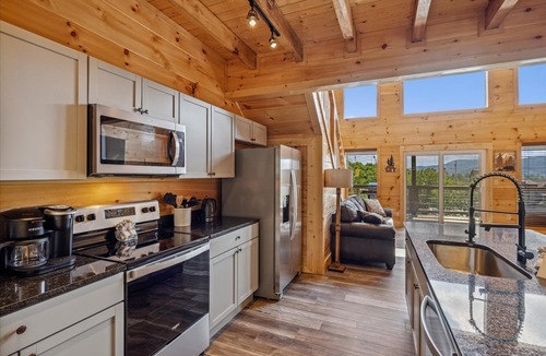 Chalet Village North Cabin | Grizzlies Den 3 Bedroom Cabin by RedAwning