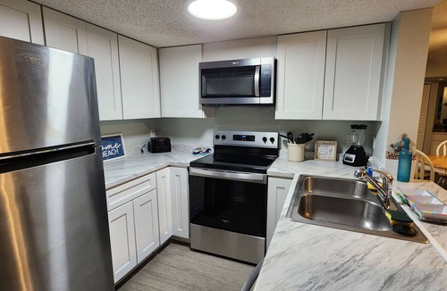 St. Augustine Beach Condo | Ground Floor Condo Oceanfront Complex Hot Tub & Pools steps away