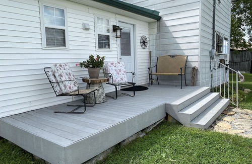 Carlisle House | Hilltop Farmhouse with 3 sunrise- sunrise porches overlooking hills and holler