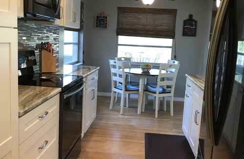 Englewood House | Lake Front Remodeled Salt Water Pool 1.5 miles to Beach-Home-3Bd/2ba/LR/Kitchen