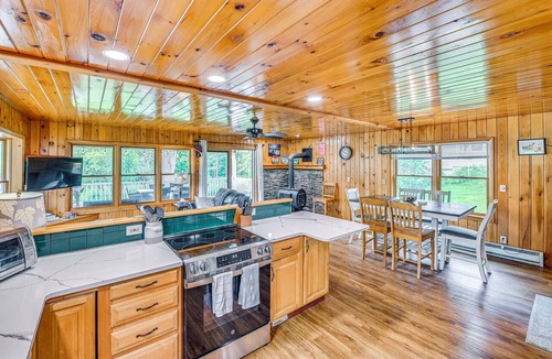 Gloversville Cottage | Lakefront Gloversville Home w/Beach + Dock!