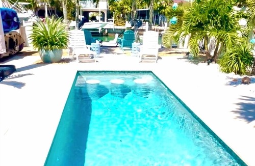 Key Colony Beach House | Lilo’s In The Keys Waterfront Tropical Retreat Tiki Private Pool Dock