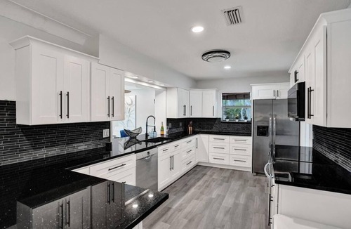 Deerfield Beach House | Luxury 5-bedrooms 4-bathrooms waterfront home heated pool, Tiki, Outdoor Kitchen