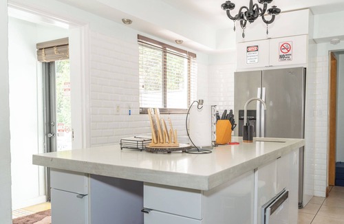 Allapattah Villa | Miami Riverfront Villa: Pool, Hot Tub, Garden, Barbecue,High Ceiling Living Room