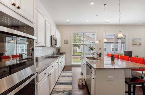 Frankford House | Ocean View Beach Club designer home with bikes, resort-style pool, sauna & gym