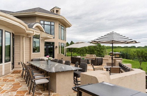 Wernersville House | Overlook Retreat Villa is a luxury private estate on 100 scenic acres for up to 18 guests. Enjoy a pool, hot tub, game room, sports court, and sweeping sunset views that make you stop mid-sentence and create lasting memories!