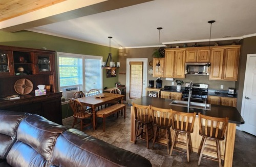 Conesus House | Private Finger Lakes Getaway with a Pool, Hot Tub, and Sauna, timber frame porch