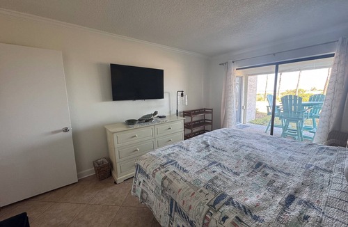 Amelia City Apartment | Relaxing OceanFront~FirstFloor~Steps to Sand~Pool
