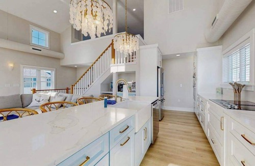 South Bethany Harbor House | Spacious pet friendly waterfront house w/deck, patio, balcony & gas grill