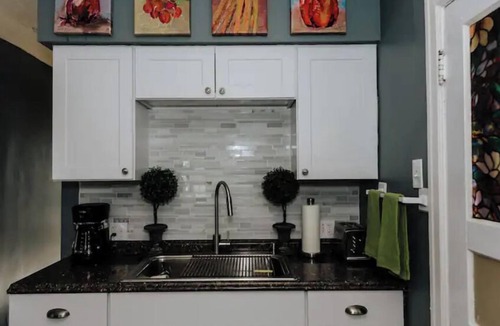 Central City House | Unique Eclectic Tudor - King Bed! Parking! 30 Night Minimum.