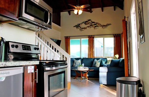 Marathon House | Waterfront Remodeled Home w/Private 35’ Boat Dock - at the foot of the iconic 7-Mile Bridge. Cozy house, water views, outdoor entertaining, private XL hot tub, walk to Sunset Grill for pool. Perfect for fishing, boaters, divers & sunset lovers.