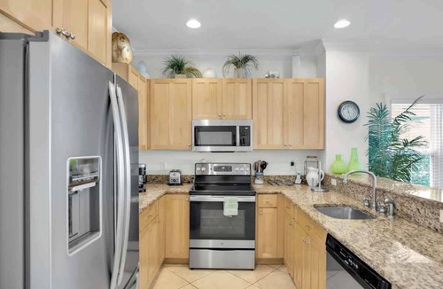 Coral Lagoon Condo | Waterfront Townhome with Boat Slip & Pool Access