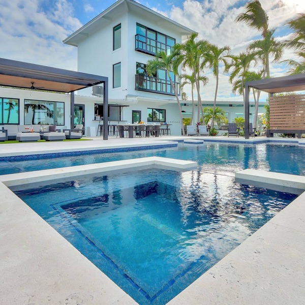 Gulfside Waterfront Luxe Estate w/private beach, pool, spa, boat dockage