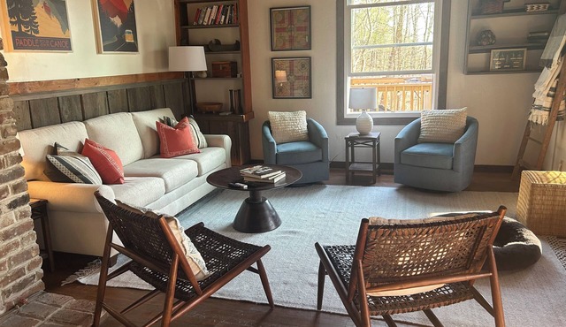 Four bedrooms in two side-by-side rustic lake cabins in Spring City, TN