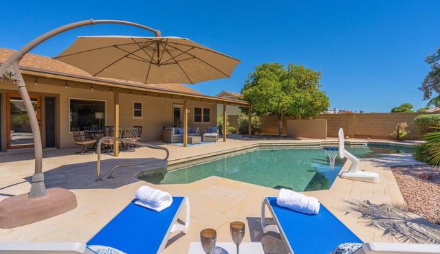 HUGE, heated pool. Family friendly, toys for all! Big & beautiful backyard!