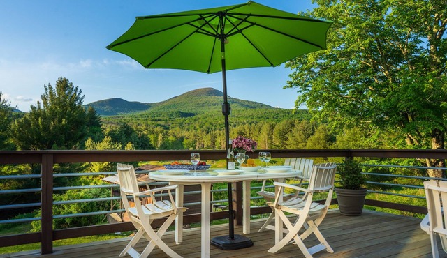 Luxurious stream-side farmhouse with spectacular mountain views