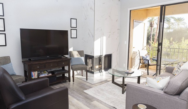 Modern top floor corner unit with pool view