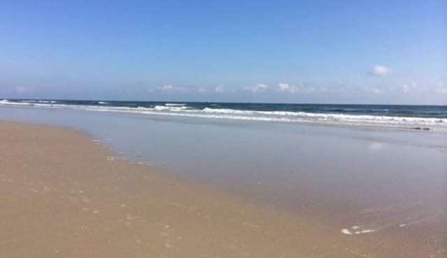 OCEAN FRONT! Beautiful views Ground Floor End Unit! Private Dock & boat ramp.