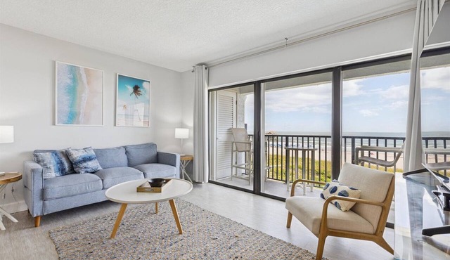 Oceanfront condo with stunning views. Steps to Cocoa Beach Pier! 🌴🌊