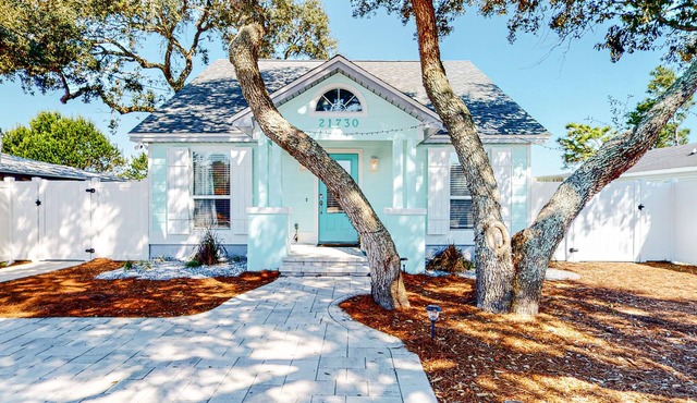Recently updated home near the beach with enclosed yard, covered porch, W/D, AC