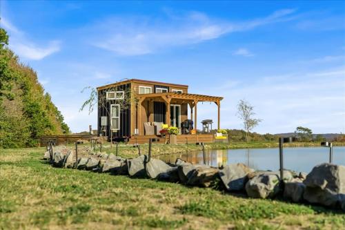 Tiny House On a Tiny Lake Porch at Waters Edge