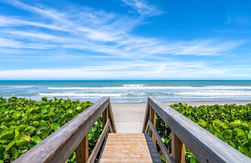 Melbourne Beach Condo | Beautiful Coastal Condo: Stunning Riverfront Views & Resort Amenities!